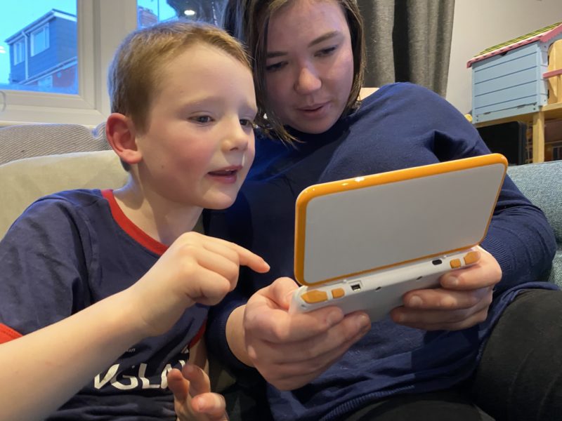 mum and child playing video games